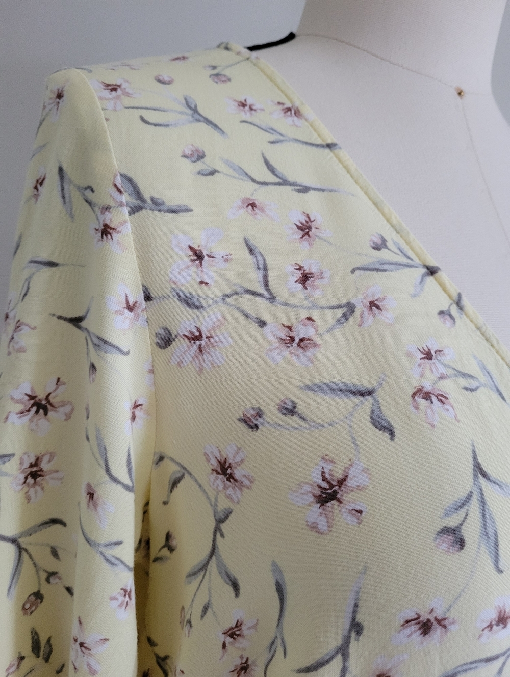 H&M dress, pastel yellow with pink flowers, flowy fabric, button down front